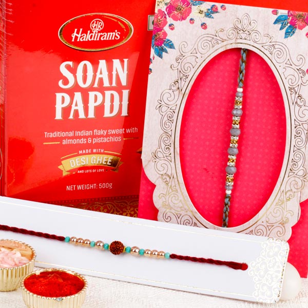 Send Rudraksha Rakhi Set With Sweet Hamper Online