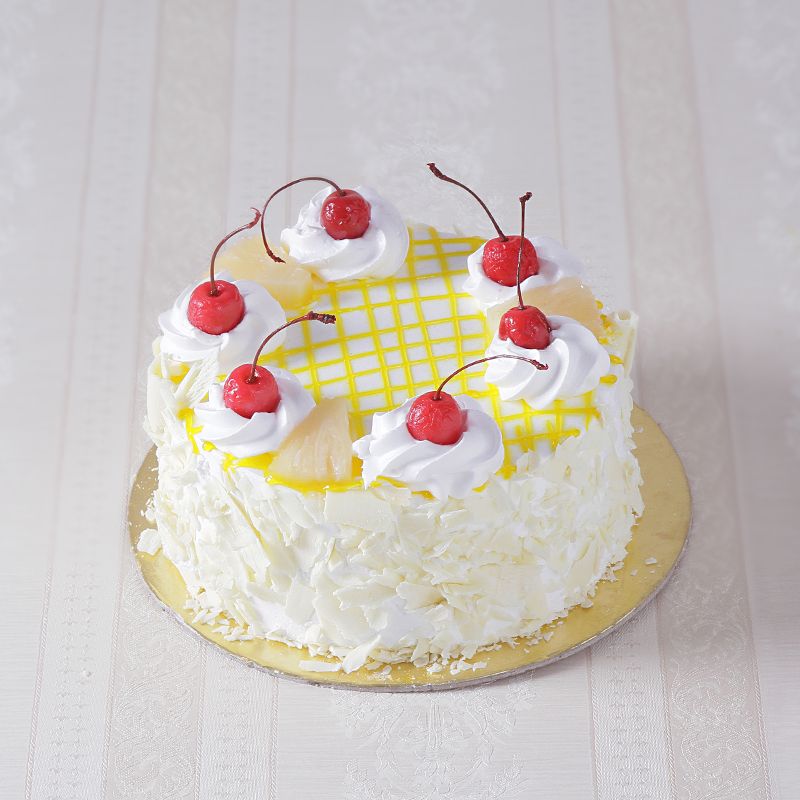 Half kg Eggless Pineapple  Cake