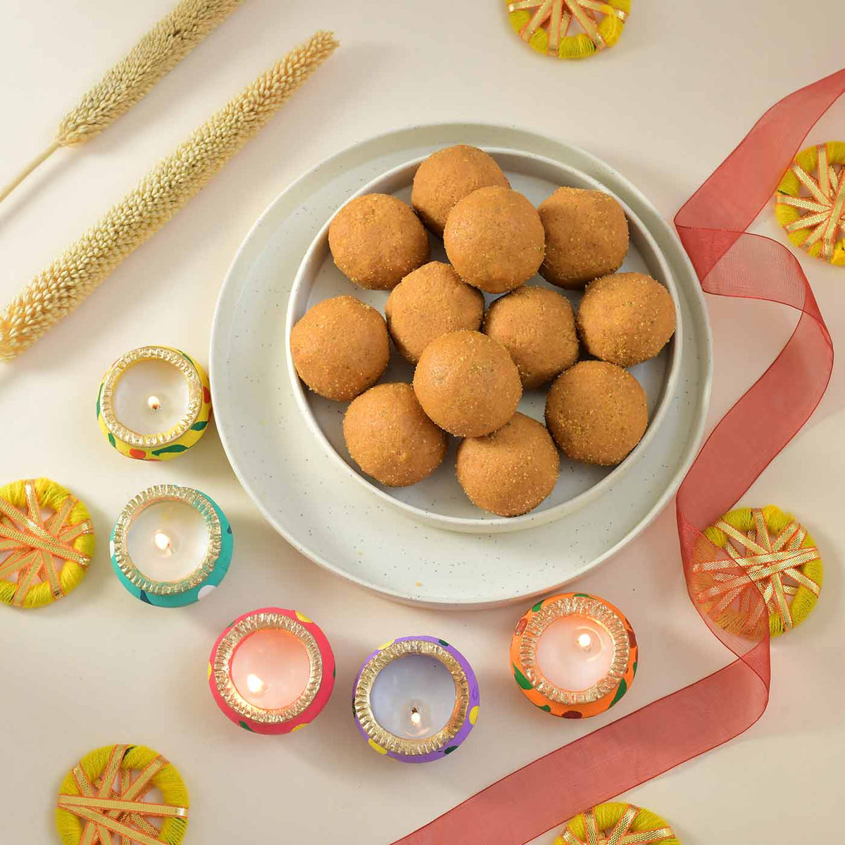 Earthen Diya and  Besan Laddu for Diwali