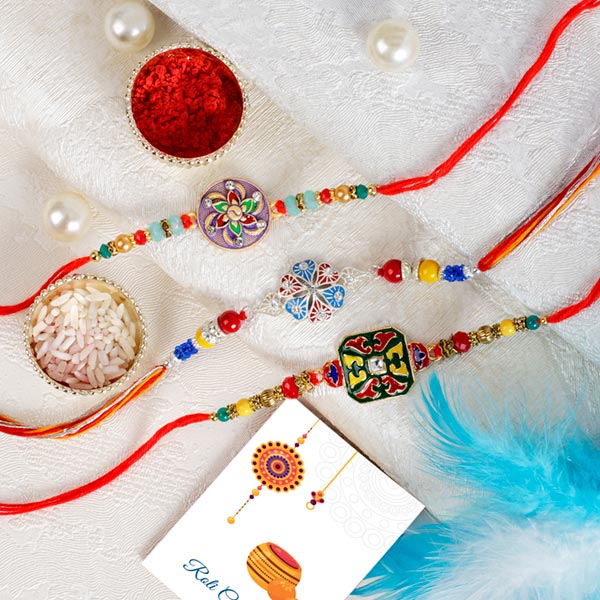 Send AmazingThree Beautiful Rakhi Set Online