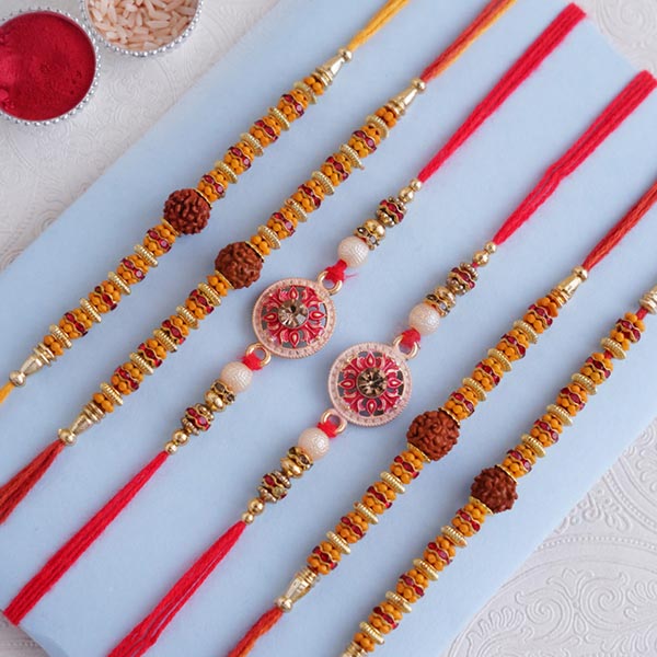 Send Set of 4 Rudraksha and Set of 2 Designer Rakhi Online