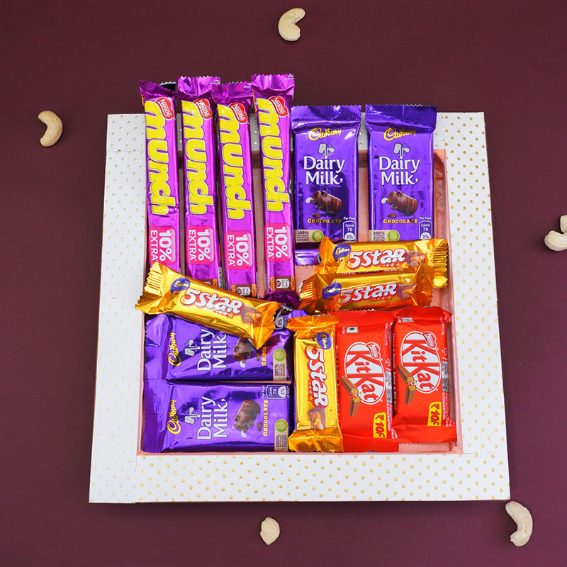 Send Set of Five Rakhis with Chocolates N Cashews in Potli Online